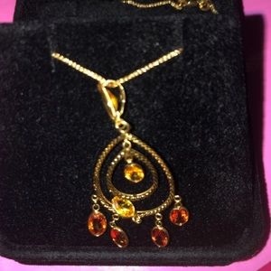 18 karat gold necklace with gemstone